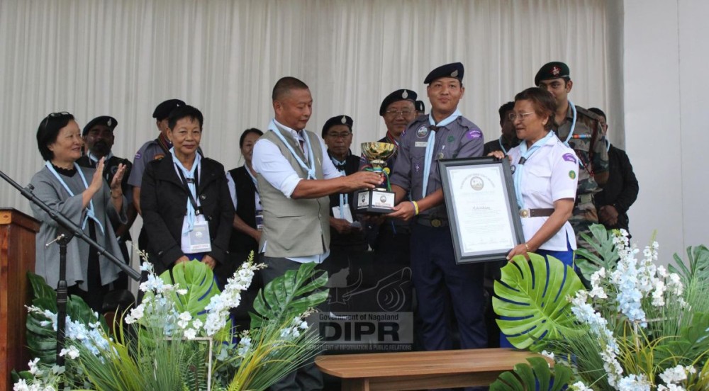 Dr Kekhriehoulie Yhome hands over the Trophy to the overall champion team during the valedictory programme held at the STC, Nerhema in Kohima on October 9. (DIPR Photo)